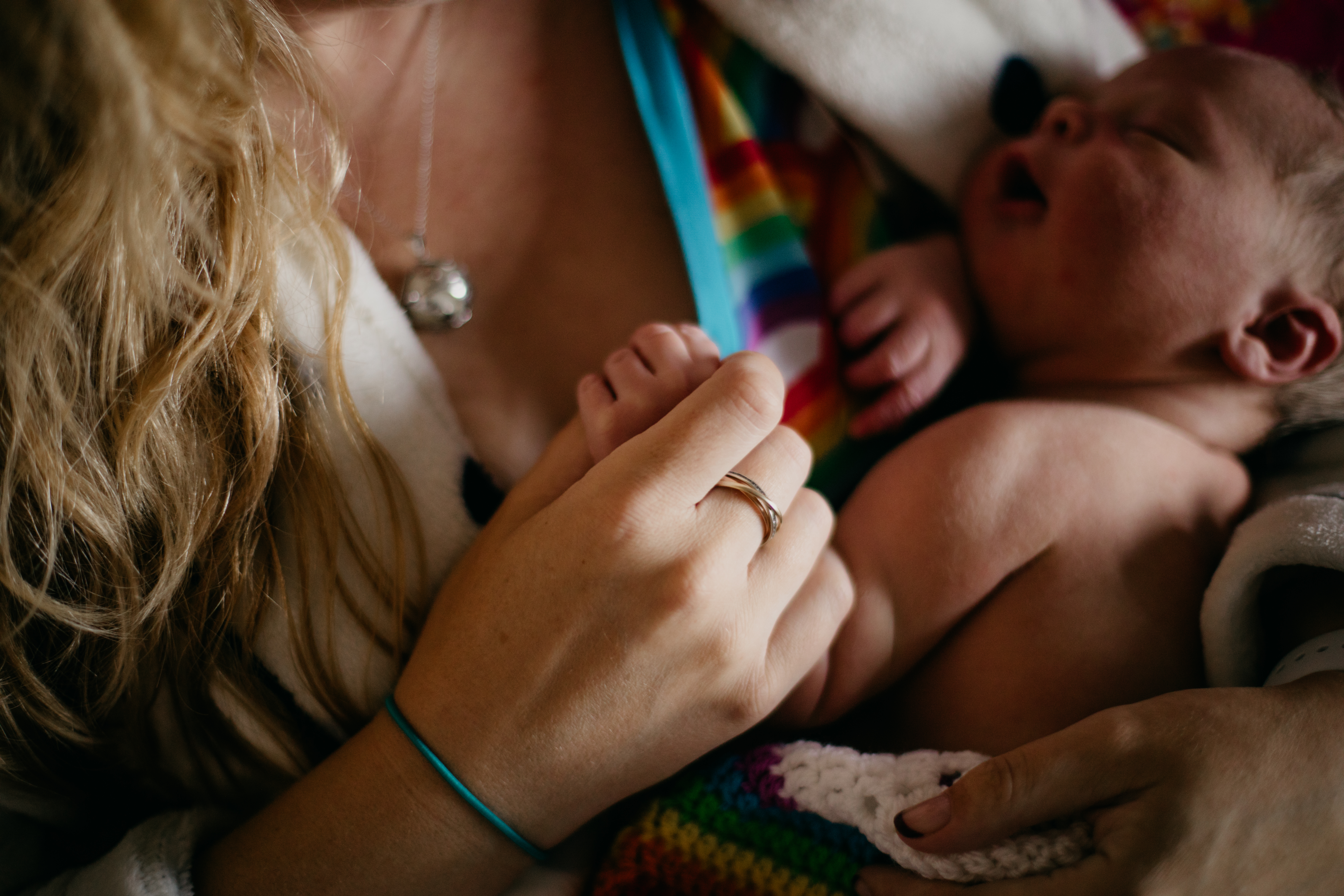 close up of woman and newborn