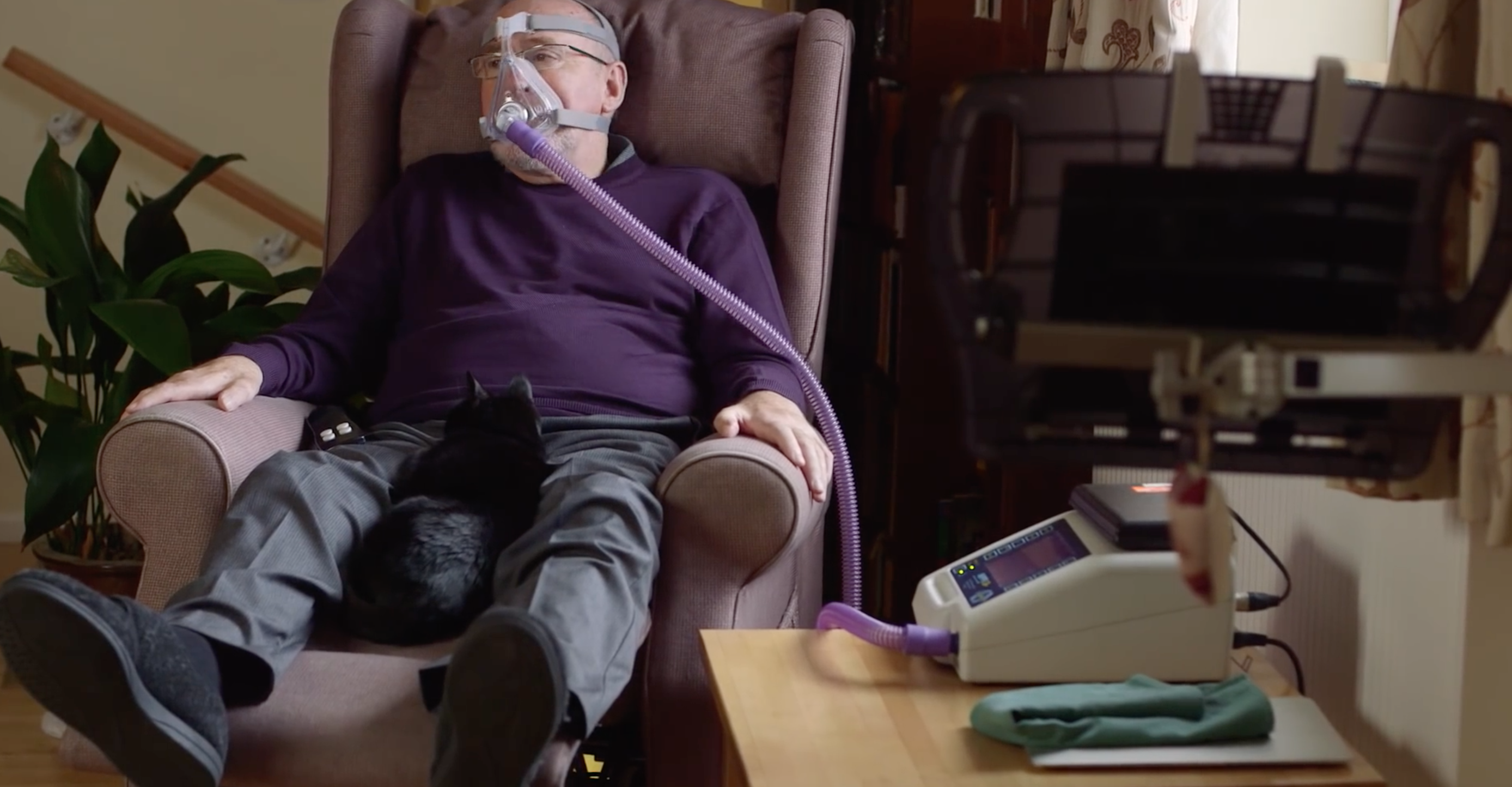 Noel Conway at home with his ventilator on